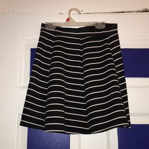 Black and white striped two piece outfit.